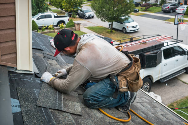 Professional Flat Roof Repair technician working in Gracey, KY